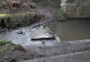 Photograph showing the manhole cover for the inlet to the South Inch Pond in the Craigie Burn before the clearance works