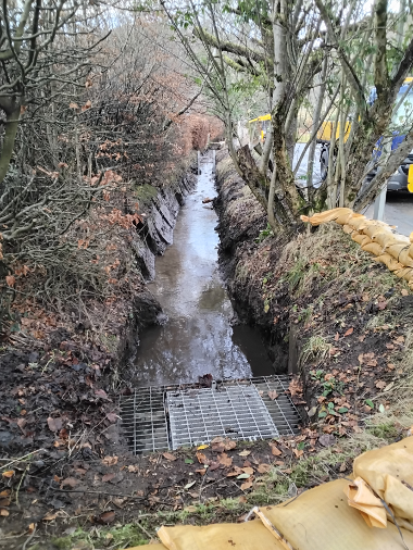 Photograph showing the Sawmill Burn at the culvert inlet at Atholl Gardens, Dunkeld after the sediment removal works